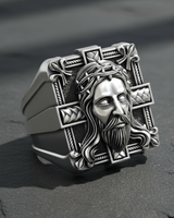925 sterling silver Jesus ring featuring crown of thorns and fleur de lis details on grey background