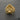 Front view of gold vermeil crowned lion ring handcrafted in 925 sterling silver on dark stone background