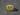 Gold vermeil ram signet ring with textured background on dark stone surface