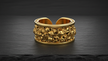 Detail view of skull band ring design showing intricate skeletal carving and open back structure