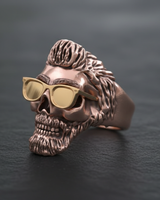 Close-up of cool skull ring design with rockabilly hair and beard details made from premium sterling silver