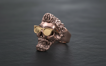 Close-up of cool skull ring design with rockabilly hair and beard details made from premium sterling silver