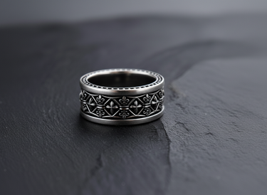 Oxidized 925 sterling silver fleur de lis ring with geometric cross pattern on black stone
