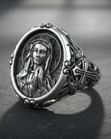 Silver Virgin Mary ring in 925 sterling silver, angled view showing the high-relief portrait and Gothic cross detail.