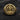 Close-up of the Jesus Christ ring face in a gold finish, highlighting the intricate carving of Christ's features and the cross.