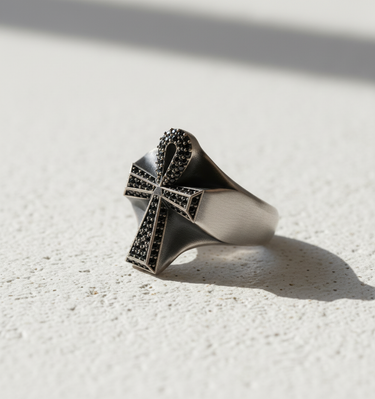 Side profile of handcrafted egyptian cross ring showing thick band and intricate setting