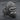 Side profile of handcrafted silver gorilla ring showing intricate ear detail and oxidized finish for depth and contrast