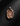 Rose gold plated silver self made woman pendant sculpting herself from rough stone background