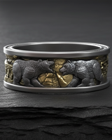 Close-up of handcrafted ring showing textured bear fur and jagged ice design details on wedding band