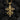 Close-up of Eastern Christian crucifix necklace showing Jesus figure and Cyrillic INRI inscription on textured silver