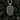 Back view of silver shield pendant featuring engraved protective prayer inscription