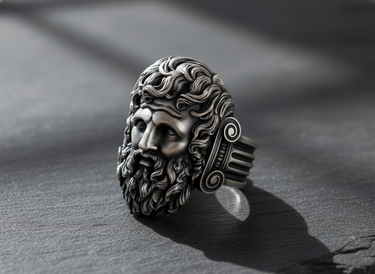 Side view of handcrafted silver Jupiter ring showing Ionic column design on the ring shank