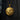 Gold vermeil style wolf moon medallion showing intricate fur texture and crater details on rustic wood