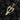 Two-tone handcrafted pendant with silver angel wings and gold vermeil sword center displayed on textured surface