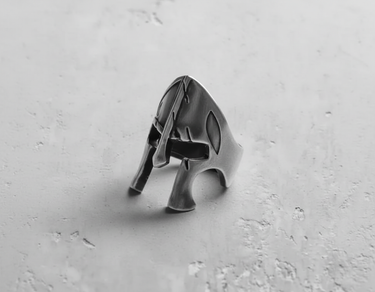Side profile of sterling silver warrior helmet ring with detailed handcrafted metalwork