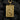 Gold vermeil silver joker card pendant with juggling jester relief displayed on black coal background