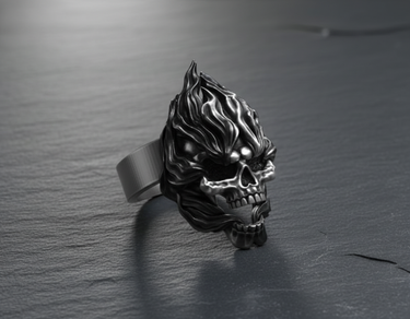 Side view of silver skull ring showing rising flames design and polished smooth band shank