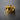 Gold-plated silver crown ring showcasing its polished faceted points and modern design, resting on a textured black background.