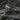 Side angle of handcrafted silver vintage ring displaying deep relief acanthus leaf engraving and thick band