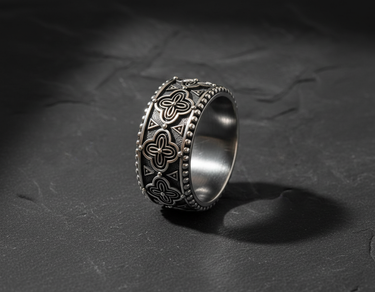 Close-up of geometric floral details on handcrafted sterling silver ring for men and women