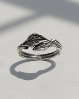 Side profile of handcrafted silver botanical ring with organic leaf motif