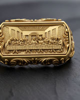 Gold vermeil silver Last Supper ring featuring detailed relief of Jesus and disciples on rectangular face