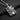 Angled view of the 925 silver Jesus Cross Pendant on a chain, highlighting the 3D relief and oxidized finish detail