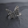 925 sterling silver butterfly ring featuring intricate flower engravings and oxidized finish