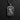 High-relief St. Jude pendant in sterling silver, detailing the saint's face and medallion on a dark slate background.
