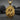Gold vermeil Saint James pendant with staff and scallop shell detail on dark background