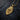 Gold variant of the wolf maiden pendant design displayed on a chain against dark background