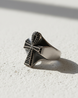 Angled perspective of handcrafted silver Ankh ring highlighting geometric cross shape and jewelry design