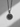 Back view of silver zodiac pendant showing engraved Ophiuchus constellation stars and celestial symbols