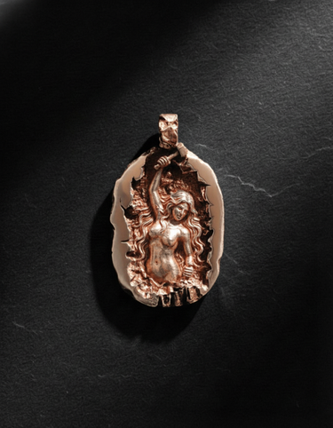 Rose gold plated Silver Self Made Woman Pendant showing figure sculpting herself from stone