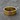 Close-up of textured metal surface and irregular edges on rose gold plated statement ring