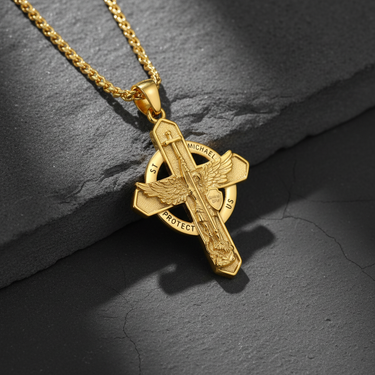 Close-up of gold vermeil St. Michael necklace showing sword and shield details on dark stone