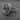 Side view of sterling silver Christian ring showing relief carving of Jesus and sacred cross symbol