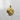 14K gold vermeil Indian chief pendant with eagle head detail displayed on white textured stone background