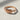 Twisted Vine Leaf Ring, rose gold finish, angled view on surface