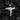 Uzi Gun Pendant, polished silver, front view on charcoal coals