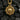 Gold variation of the skull and rudder pendant design highlighting the detailed craftsmanship