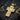 Gold plated version of St. Michael protection amulet showing intricate warrior design and religious banner