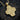 Gold variant of tree of life pendant displaying intricate leaf details and sturdy bail