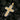 Back view of silver cross pendant showing geometric gold and silver architectural design with sturdy bail