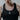 Model with tattoos wearing the 925 sterling silver Orthodox icon locket with a black tank top for a modern look.