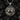 Angled view of the handcrafted Silver Gemini Pendant, highlighting the three-dimensional relief and oxidized finish.