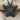 Feather Wing Butterfly Pendant, black rhodium plated, front view on fabric