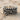 Baroque Foliage Band Ring, detail view on sand