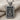 Front view of the handcrafted Joker card pendant showing detailed typography and textured background