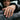 Heraldic Lily Ring, worn on model hand resting on car window